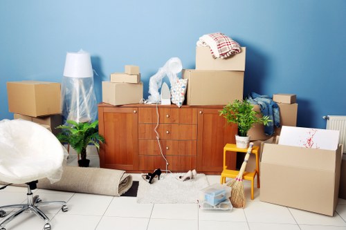 Moving boxes and furniture being prepared for a relocation in St Johns Wood