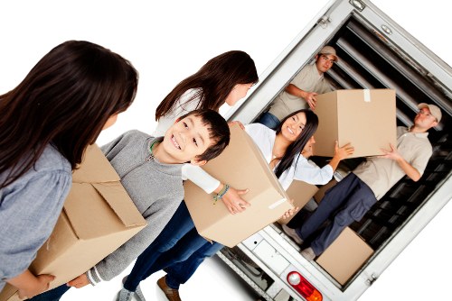Moving crew loading household items for a relocation service