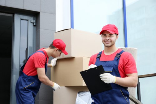 Helper loading furniture for a man with a van job in St Johns Wood