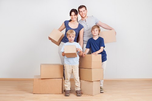 Professional movers handling apartment relocation in St Johns Wood