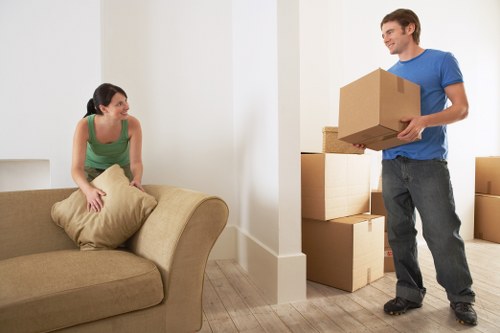 Professional movers transporting office furniture locally